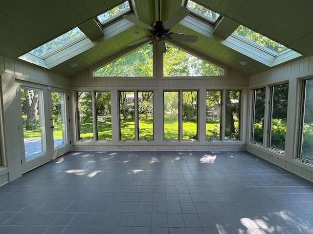 1622 Indian Knoll Rd, Naperville, IL 60565 - unfurnished sunroom featuring a skylight, tile patterned floors, and high vaulted ceiling