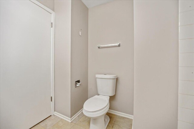 30W014 Willow Ln Unit 1, Warrenville, IL 60555 - bathroom featuring toilet, tile patterned floors, and baseboards