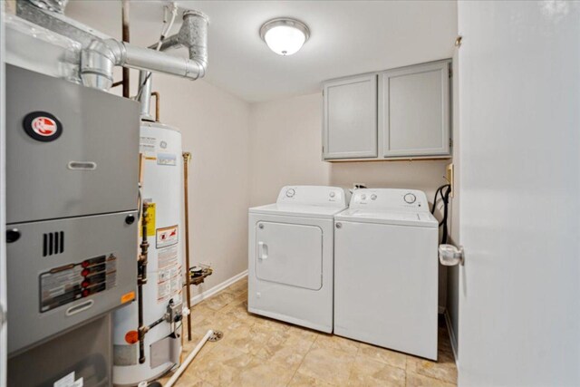 30W014 Willow Ln Unit 1, Warrenville, IL 60555 - laundry area with cabinet space, washer and clothes dryer, gas water heater, heating unit, and baseboards