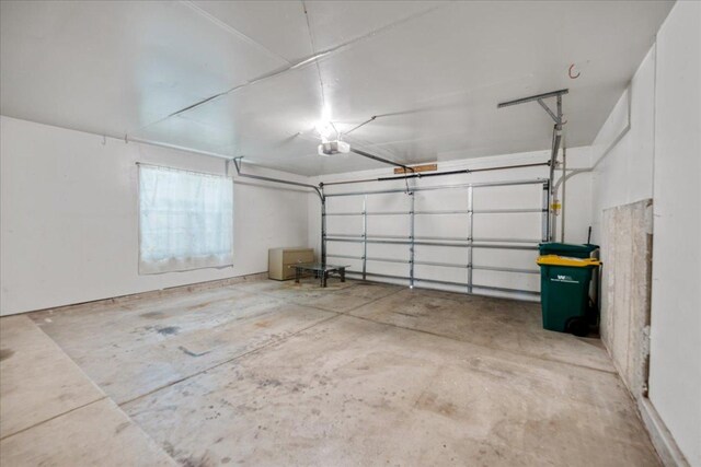 30W014 Willow Ln Unit 1, Warrenville, IL 60555 - garage featuring a garage door opener