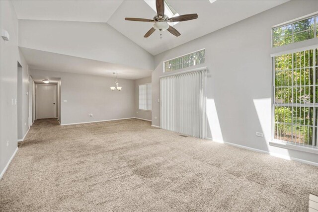 30W014 Willow Ln Unit 1, Warrenville, IL 60555 - carpeted empty room with ceiling fan, a chandelier, high vaulted ceiling, and baseboards