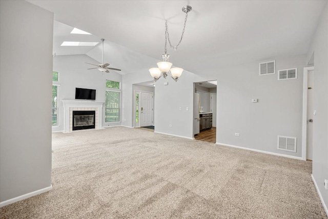 30W014 Willow Ln Unit 1, Warrenville, IL 60555 - unfurnished living room featuring carpet floors, a ceiling fan, baseboards, a tile fireplace, and vaulted ceiling