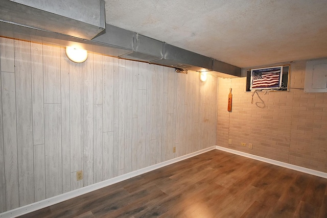 717 Carlisle Rd, Batavia, IL 60510 - finished below grade area featuring electric panel, wood finished floors, and wooden walls