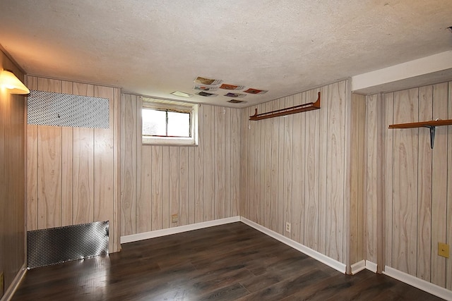 717 Carlisle Rd, Batavia, IL 60510 - below grade area featuring wood walls, wood finished floors, and a textured ceiling