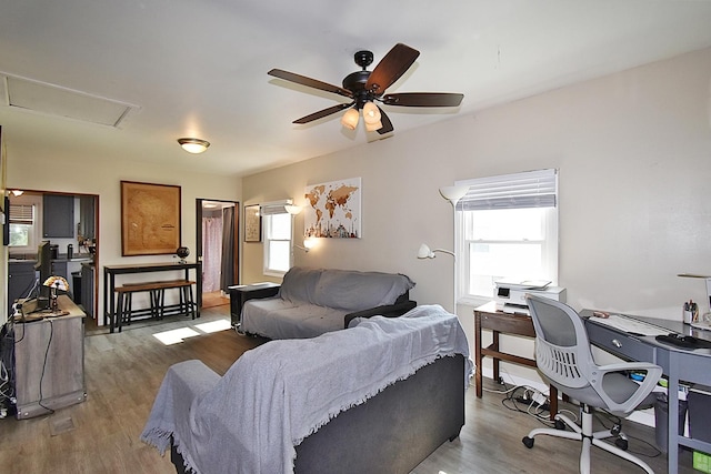 717 Carlisle Rd, Batavia, IL 60510 - living room featuring light wood-style flooring, a ceiling fan, and a desk