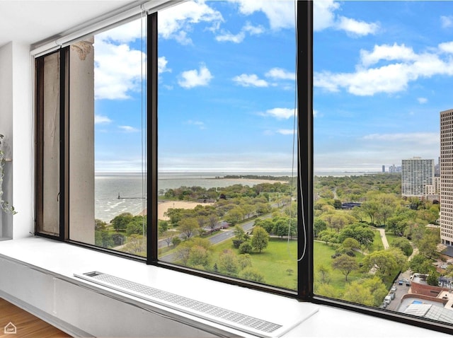 5455 N Sheridan Rd Unit 2206, Chicago, IL 60640 - detailed view of a nearby body of water, a city view, and a tree filled landscape