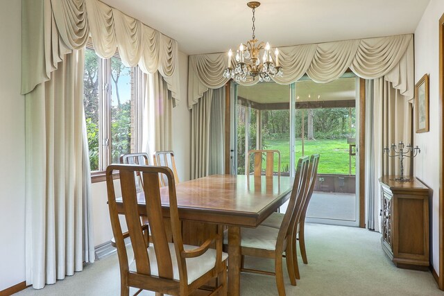 1131 Blanchard St, Downers Grove, IL 60516 - dining space featuring a chandelier and light carpet