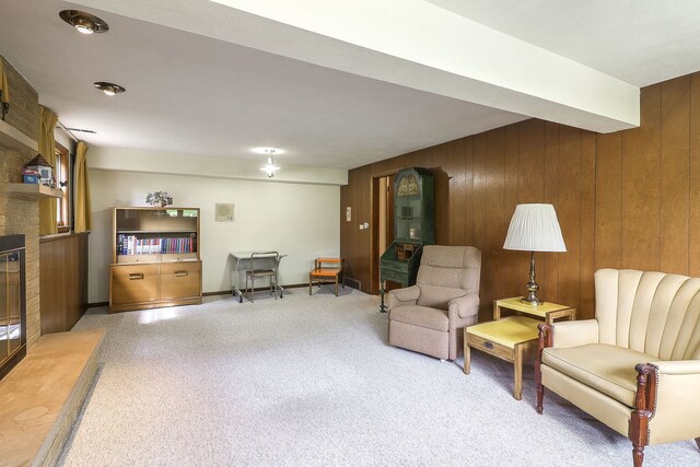1131 Blanchard St, Downers Grove, IL 60516 - living area featuring light carpet, wooden walls, and a fireplace
