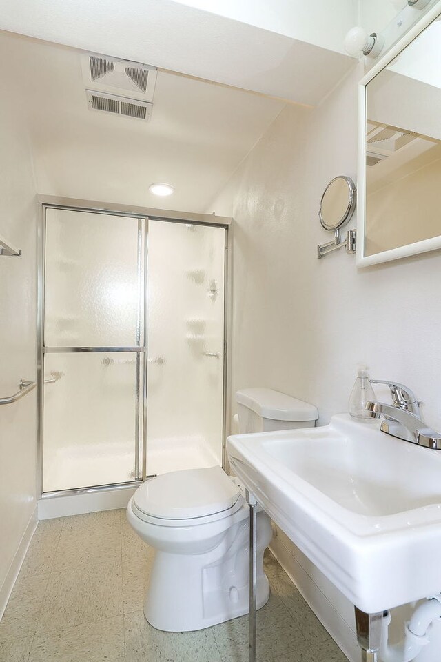1131 Blanchard St, Downers Grove, IL 60516 - bathroom with toilet, a shower stall, and a sink