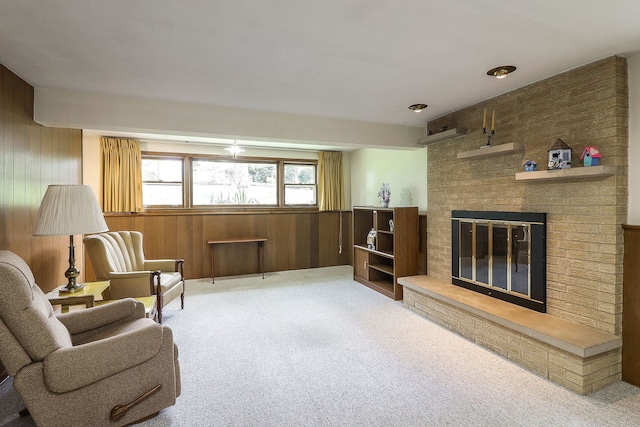 1131 Blanchard St, Downers Grove, IL 60516 - living area with wooden walls, carpet flooring, and a brick fireplace