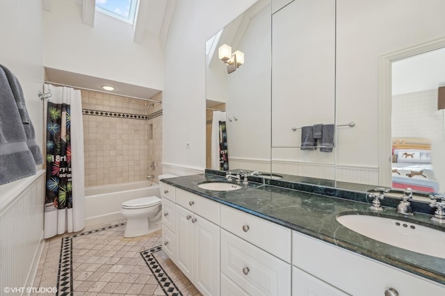 677 Greenleaf Ave, Glencoe, IL 60022 - full bath with double vanity, shower / bath combination with curtain, tile patterned floors, toilet, and a towering ceiling
