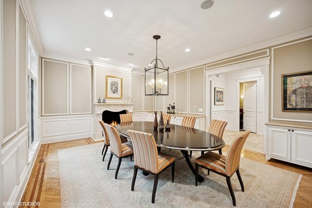 677 Greenleaf Ave, Glencoe, IL 60022 - dining room featuring a decorative wall, a chandelier, crown molding, and recessed lighting