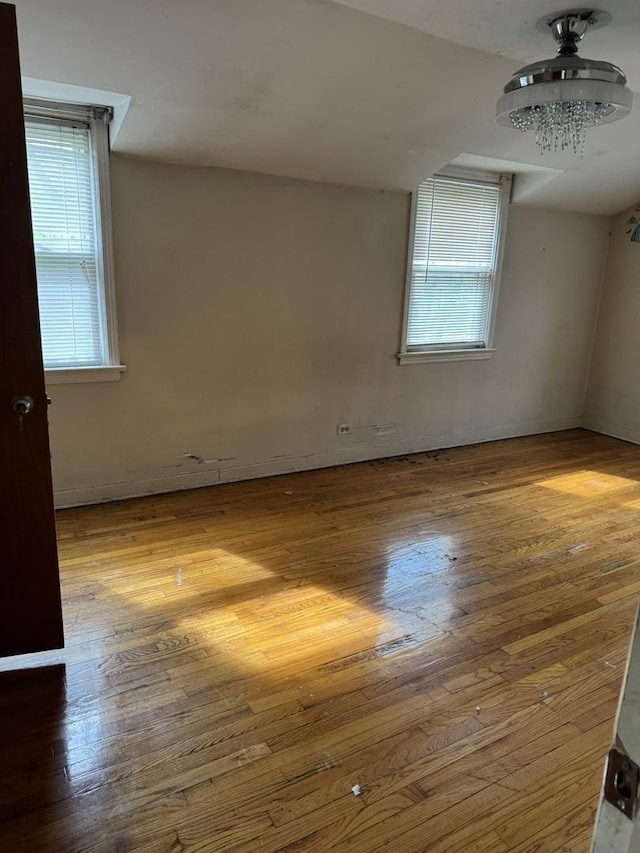 10035 S Yates Blvd, Chicago, IL 60617 - unfurnished room featuring wood-type flooring
