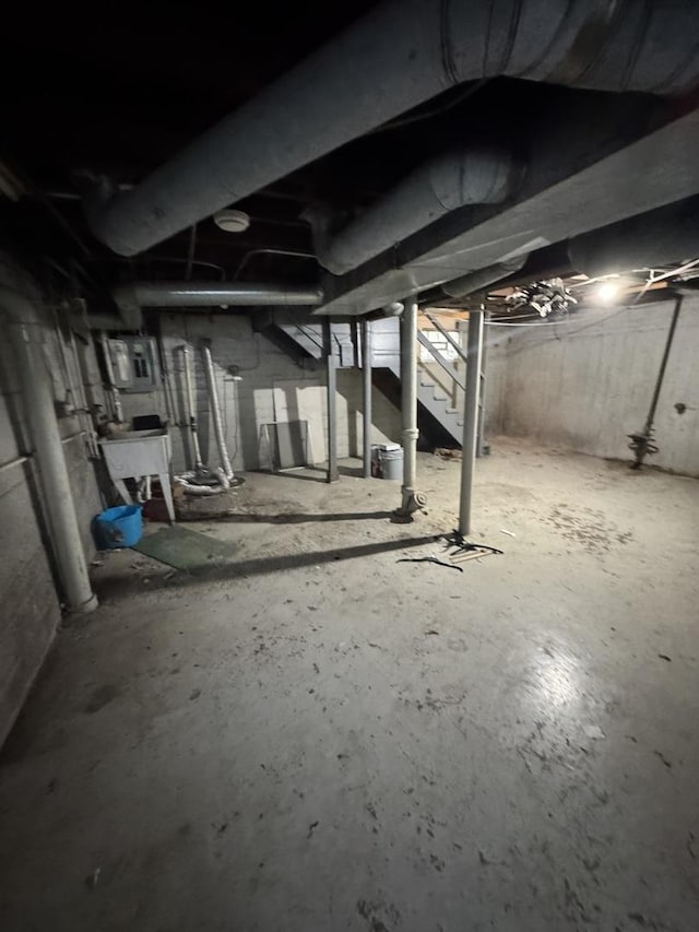10035 S Yates Blvd, Chicago, IL 60617 - unfinished below grade area featuring stairway and a sink