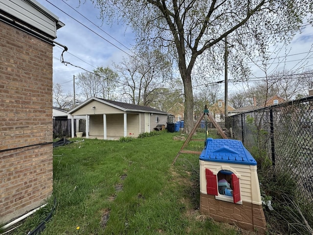 10035 S Yates Blvd, Chicago, IL 60617 - view of yard featuring an outdoor structure