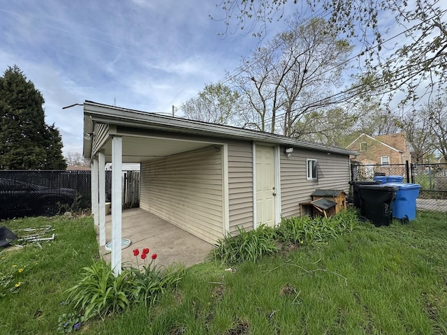 10035 S Yates Blvd, Chicago, IL 60617 - view of outdoor structure with a carport