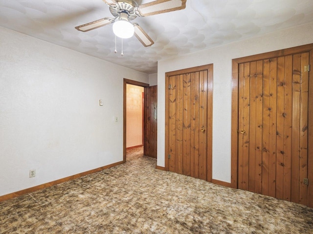 5123 Walnut Gove, Poplar Grove, IL 61065 - unfurnished bedroom featuring two closets, carpet flooring, baseboards, and ceiling fan