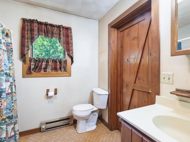 5123 Walnut Gove, Poplar Grove, IL 61065 - bathroom with a baseboard radiator, toilet, vanity, tile patterned floors, and baseboards