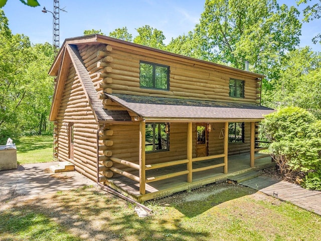 5123 Walnut Gove, Poplar Grove, IL 61065 - view of front of house with log exterior and a shingled roof