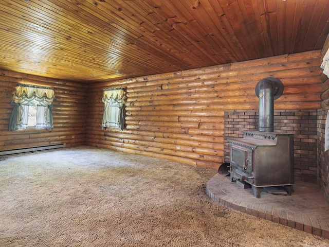 5123 Walnut Gove, Poplar Grove, IL 61065 - unfurnished living room featuring carpet flooring, a wood stove, and a baseboard heating unit