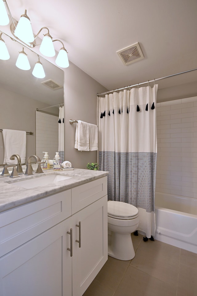 2136 Camden Ln Unit 2136, Hanover Park, IL 60133 - bathroom with vanity, toilet, shower / bath combo, and tile patterned flooring