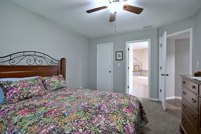 2136 Camden Ln Unit 2136, Hanover Park, IL 60133 - bedroom featuring carpet, ensuite bathroom, and ceiling fan