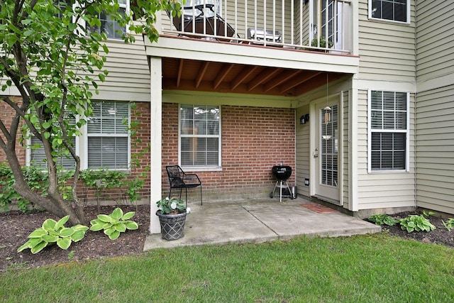 2136 Camden Ln Unit 2136, Hanover Park, IL 60133 - view of patio / terrace featuring a balcony and area for grilling