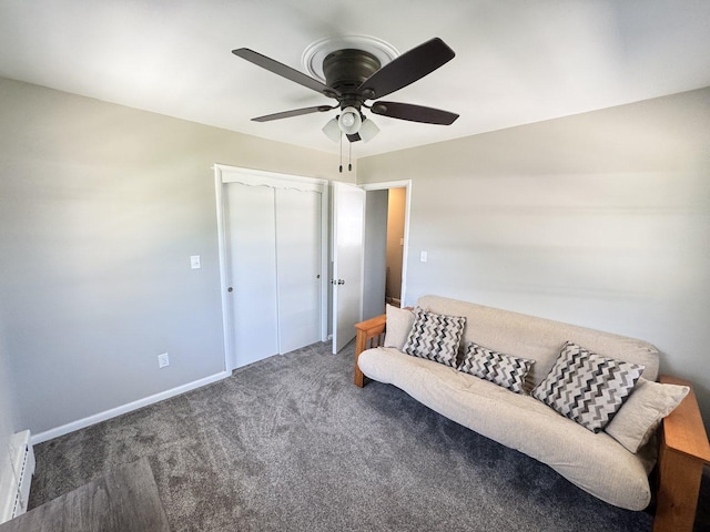1128 Somonauk St, Sycamore, IL 60178 - sitting room featuring a ceiling fan, carpet flooring, baseboard heating, and baseboards
