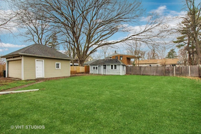 443 Harrison St, West Chicago, IL 60185 - view of yard with an outbuilding and a garage