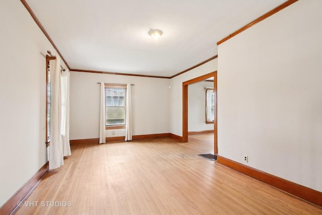 443 Harrison St, West Chicago, IL 60185 - spare room with crown molding, light wood-type flooring, and baseboards