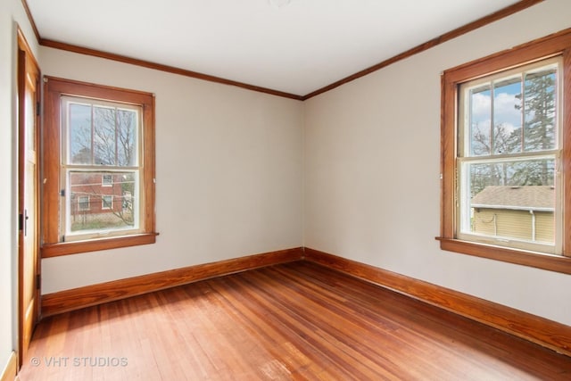 443 Harrison St, West Chicago, IL 60185 - unfurnished room featuring hardwood / wood-style flooring, baseboards, and crown molding