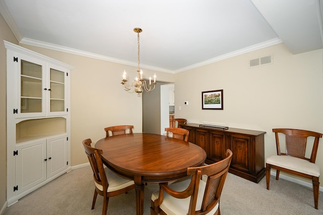 2107 Timber Ln, Wheaton, IL 60189 - dining room featuring ornamental molding, a chandelier, and light colored carpet