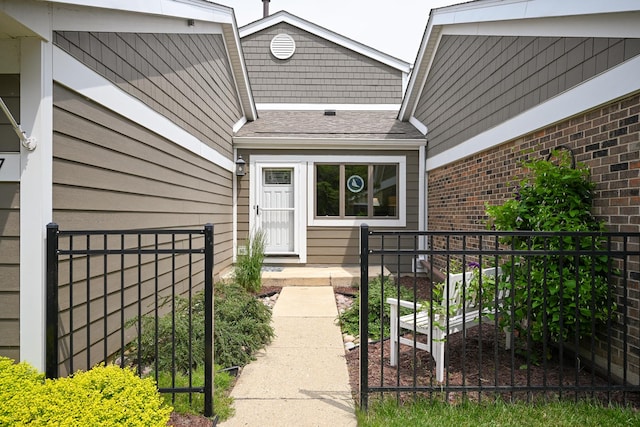 2107 Timber Ln, Wheaton, IL 60189 - property entrance featuring a shingled roof and brick siding