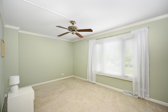 2107 Timber Ln, Wheaton, IL 60189 - spare room featuring crown molding, carpet flooring, and a ceiling fan