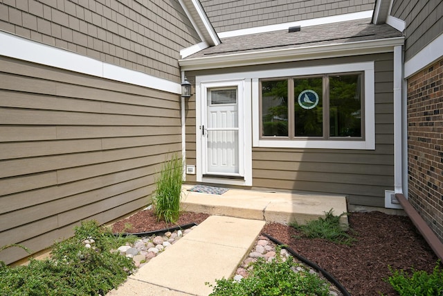 2107 Timber Ln, Wheaton, IL 60189 - property entrance featuring roof with shingles and brick siding