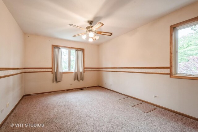 1214 W Talcott Rd, Park Ridge, IL 60068 - carpeted empty room with a ceiling fan and baseboards