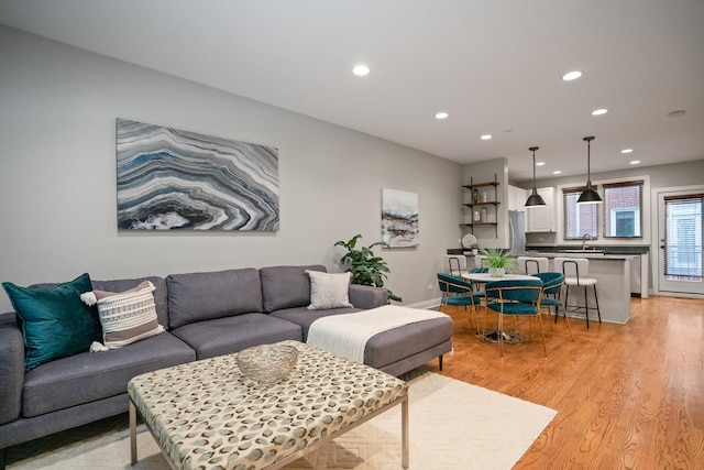 2803 N Wolcott Ave Unit D, Chicago, IL 60657 - living room featuring light wood-style flooring, recessed lighting, and baseboards