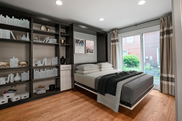 2803 N Wolcott Ave Unit D, Chicago, IL 60657 - bedroom with light wood-style flooring and recessed lighting