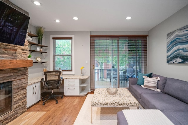 2803 N Wolcott Ave Unit D, Chicago, IL 60657 - home office with light wood-style flooring, built in study area, recessed lighting, and a fireplace