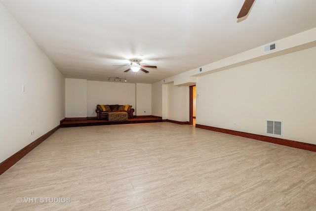 10944 Arbor Ridge Dr, Orland Park, IL 60467 - unfurnished living room featuring ceiling fan and light wood-type flooring