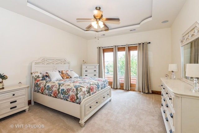 10944 Arbor Ridge Dr, Orland Park, IL 60467 - bedroom with a raised ceiling, light colored carpet, and ceiling fan