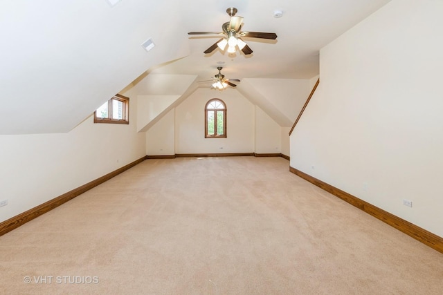 10944 Arbor Ridge Dr, Orland Park, IL 60467 - bonus room with light colored carpet, plenty of natural light, ceiling fan, and lofted ceiling