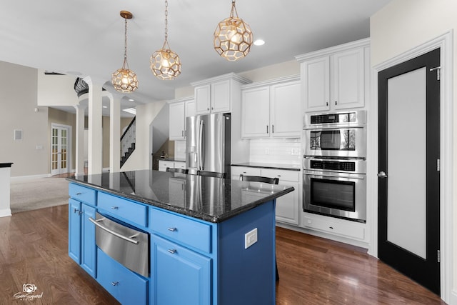 491 Bloomfield Cir W, Oswego, IL 60543 - kitchen featuring a warming drawer, blue cabinets, appliances with stainless steel finishes, white cabinets, and recessed lighting