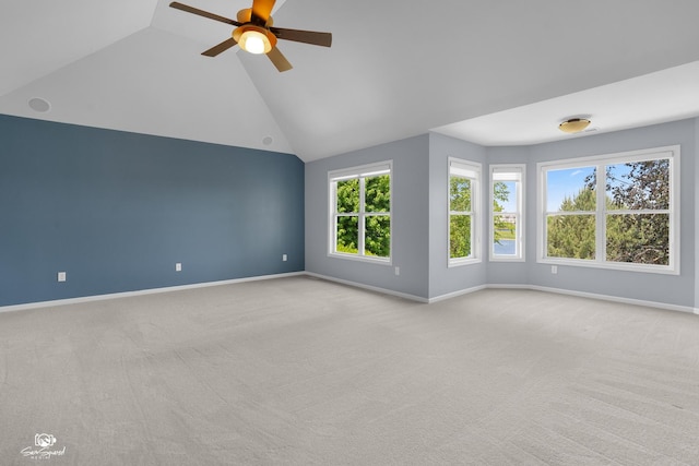 491 Bloomfield Cir W, Oswego, IL 60543 - spare room featuring lofted ceiling, a ceiling fan, carpet, and baseboards