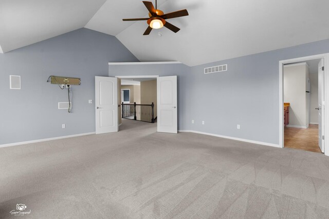 491 Bloomfield Cir W, Oswego, IL 60543 - unfurnished bedroom featuring carpet flooring, baseboards, ceiling fan, and high vaulted ceiling