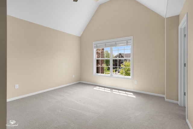 491 Bloomfield Cir W, Oswego, IL 60543 - carpeted empty room with vaulted ceiling, baseboards, and a ceiling fan