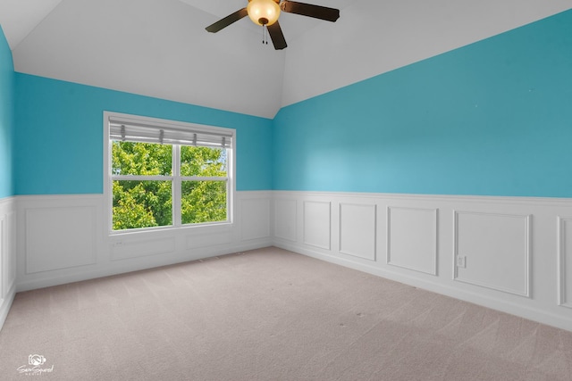 491 Bloomfield Cir W, Oswego, IL 60543 - unfurnished room featuring wainscoting, ceiling fan, carpet, a decorative wall, and high vaulted ceiling