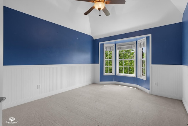491 Bloomfield Cir W, Oswego, IL 60543 - unfurnished room featuring a wainscoted wall, ceiling fan, carpet, and high vaulted ceiling