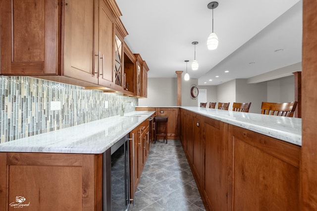 491 Bloomfield Cir W, Oswego, IL 60543 - kitchen with beverage cooler, brown cabinets, decorative backsplash, and recessed lighting