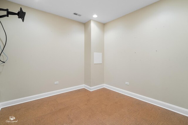 491 Bloomfield Cir W, Oswego, IL 60543 - spare room featuring baseboards and recessed lighting